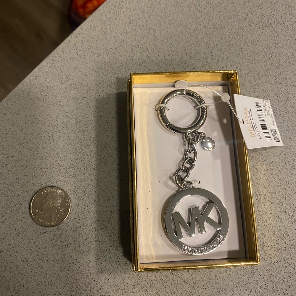Silver Michael Kors logo keychain